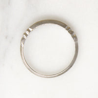 Sparkly Diamonds in Exquisitely Modeled Platinum Band