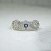 A Trio of Flowers Diamonds and Sapphire Ring