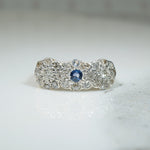 A Trio of Flowers Diamonds and Sapphire Ring
