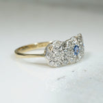 A Trio of Flowers Diamonds and Sapphire Ring