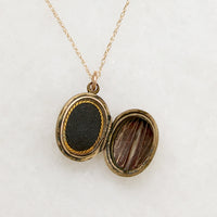 Interesting 9ct English Gold Oval Locket