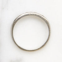 Slender Channel-Set Diamond Platinum Band