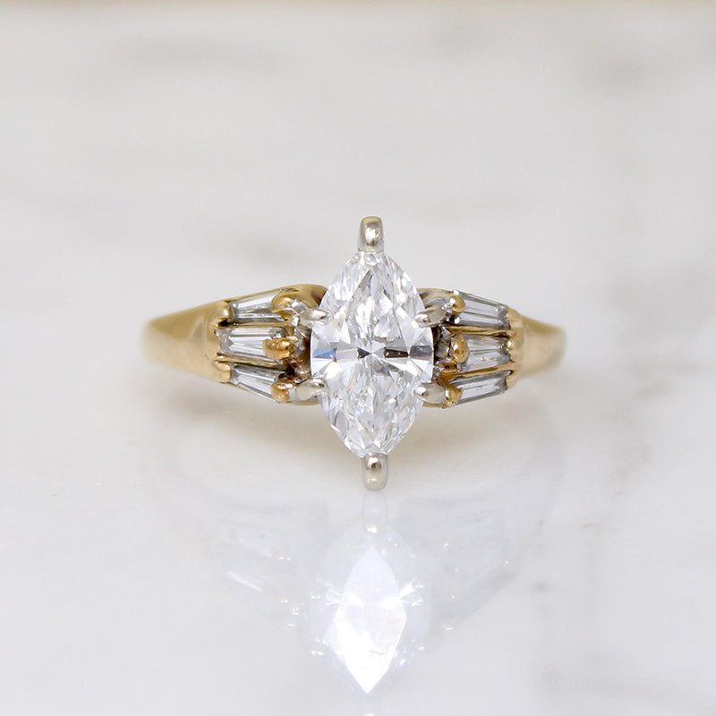Dramatic Moval Diamond Ring with Baguette Accents