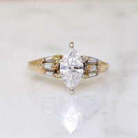 Dramatic Moval Diamond Ring with Baguette Accents