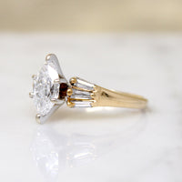 Dramatic Moval Diamond Ring with Baguette Accents