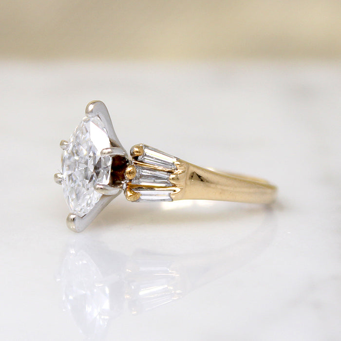 Dramatic Moval Diamond Ring with Baguette Accents