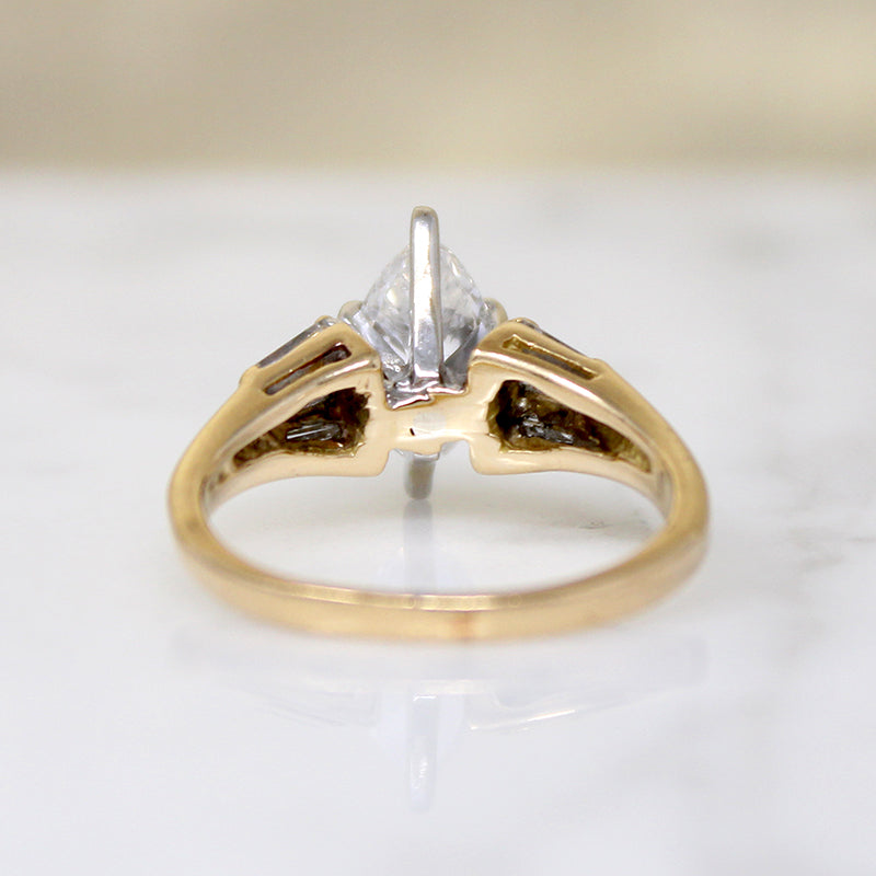 Dramatic Moval Diamond Ring with Baguette Accents