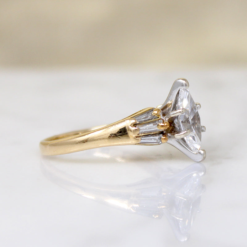 Dramatic Moval Diamond Ring with Baguette Accents