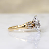 Dramatic Moval Diamond Ring with Baguette Accents