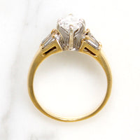 Dramatic Moval Diamond Ring with Baguette Accents