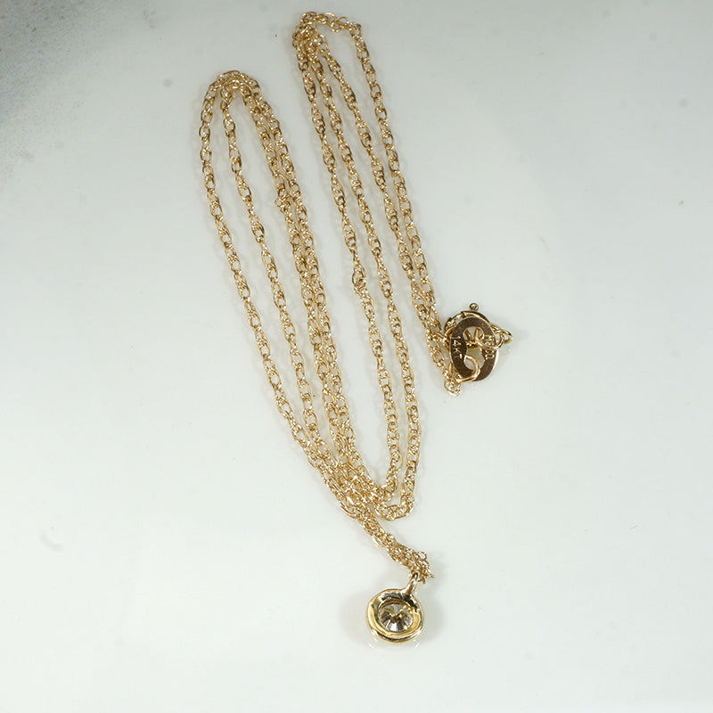 Delightful Diamond Solitaire in Gold Bezel Pendant