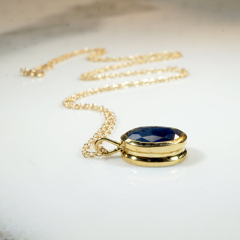 Natural 1.35ct Oval Sapphire in Gold Bezel Pendant