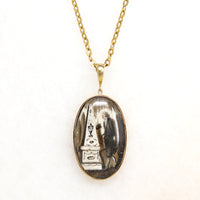 Somber Miniature Painting in Gold Pendant