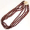 Four Strand Waterfall of Garnet Beads with Gold Clasp