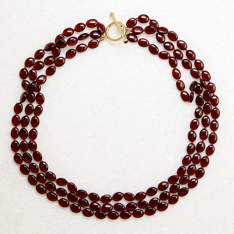 Four Strand Garnet Beads with Gold & Garnet Clasp