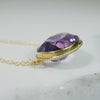 Vibrant Oval Amethyst in Gold Bezel Necklace