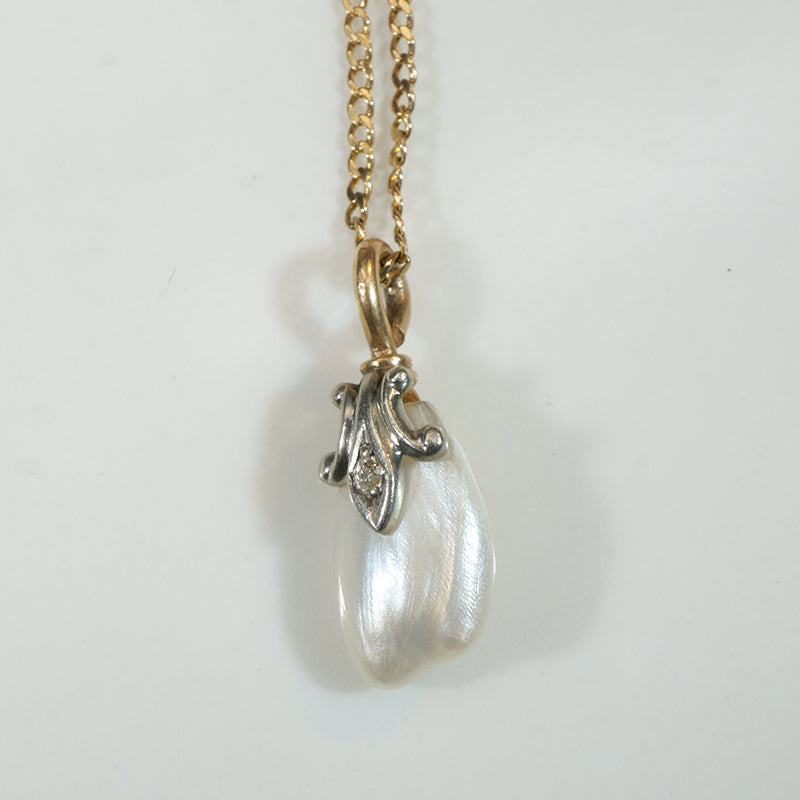 Baroque Pearl Pendant Capped in Gold, Platinum & Diamond