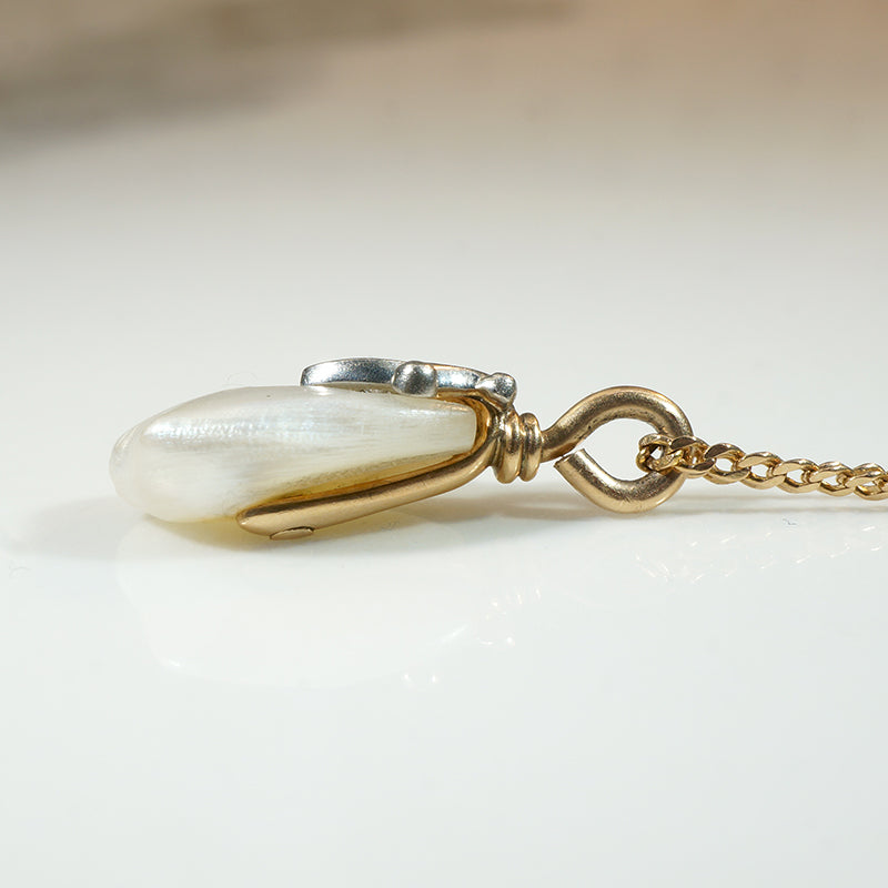 Baroque Pearl Pendant Capped in Gold, Platinum & Diamond