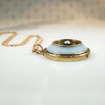 Pale Blue Agate Pendant in Engraved & Enameled Gold