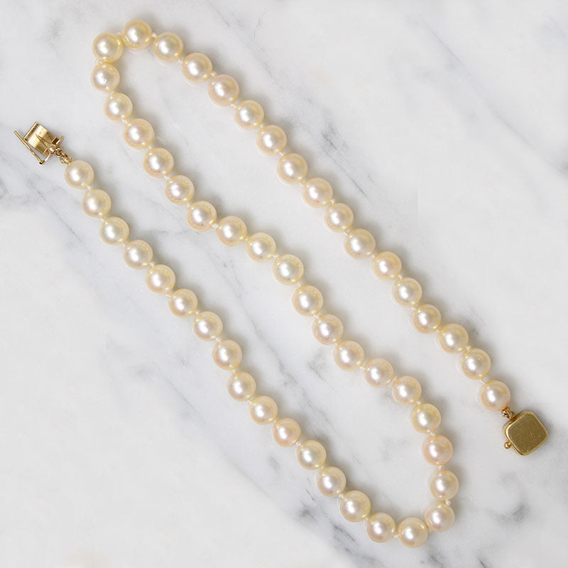 Irresistible 18" Strand of Creamy Pearls with Chic Gold Clasp