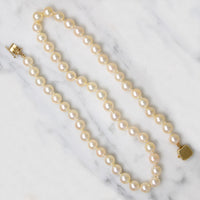Irresistible 18" Strand of Creamy Pearls with Chic Gold Clasp