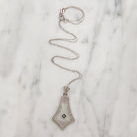 Kite-Shaped Camphor Glass in White Gold Filigree Necklace