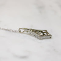 Graceful Deco Pendant with Diamond Dangle