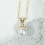 Elegant Pearl Pendant with Diamond Accent