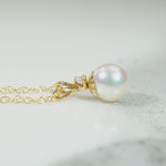 Elegant Pearl Pendant with Diamond Accent