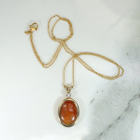 Spicy Red Jade in Gold Pendant with Diamond