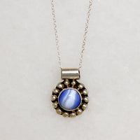 Cheerful Blue Art Glass in Silver Petaled Pendant