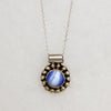 Cheerful Blue Art Glass in Silver Petaled Pendant