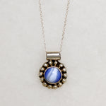 Cheerful Blue Art Glass in Silver Petaled Pendant
