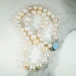 Pastel Pearls on Blue Silk with Opal Clasp