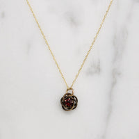 Engraved Gold & Garnet Love Knot Necklace