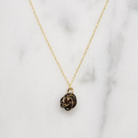 Engraved Gold & Garnet Love Knot Necklace
