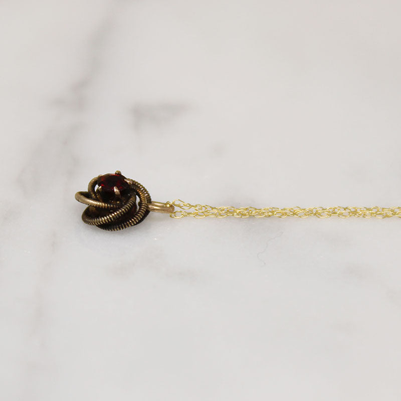 Engraved Gold & Garnet Love Knot Necklace