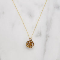 Witchy Gold & Ruby Pentagram Love Knot Pendant