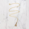 Wee Gold Wishbone Pendant with Tiny Pink Opal
