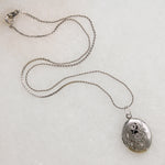 Cheerful Engraved Silver-Tone Oval Locket