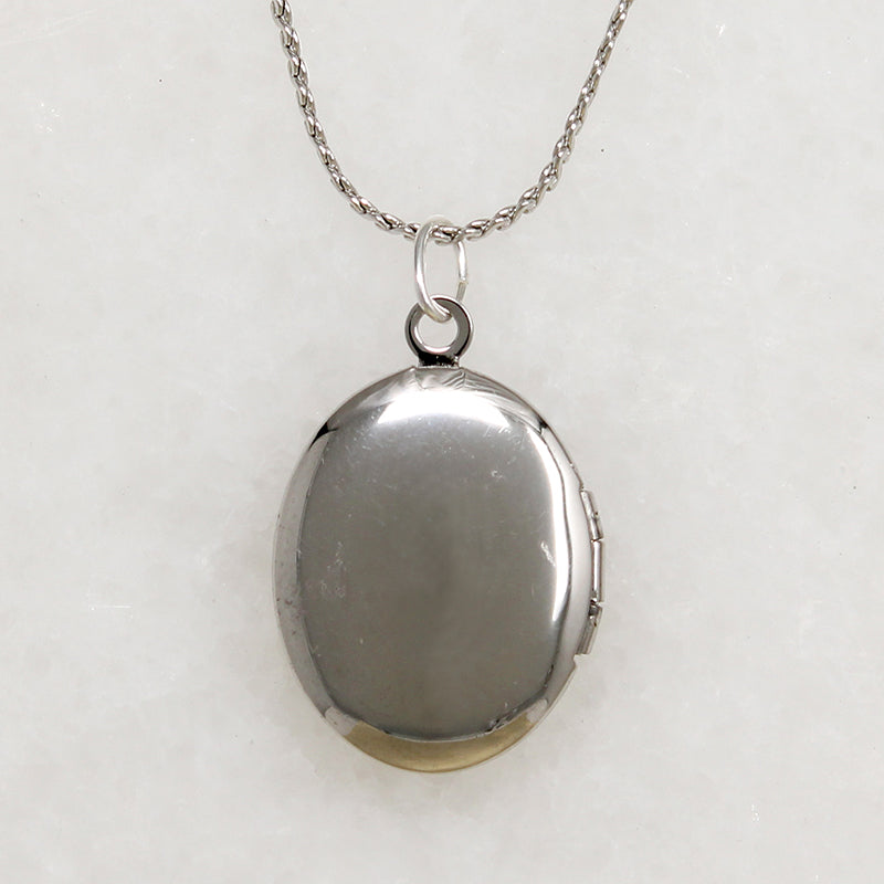 Cheerful Engraved Silver-Tone Oval Locket