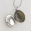 Cheerful Engraved Silver-Tone Oval Locket