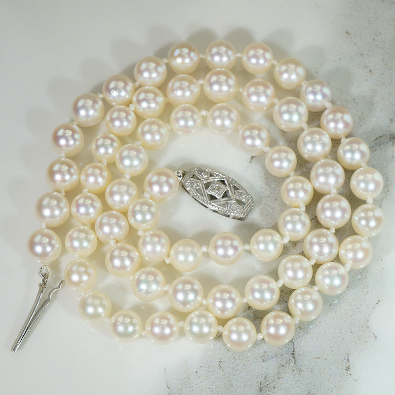 Matinee Length Pearl Necklace with Decorative Diamond Clasp