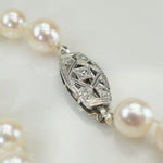 Matinee Length Pearl Necklace with Decorative Diamond Clasp