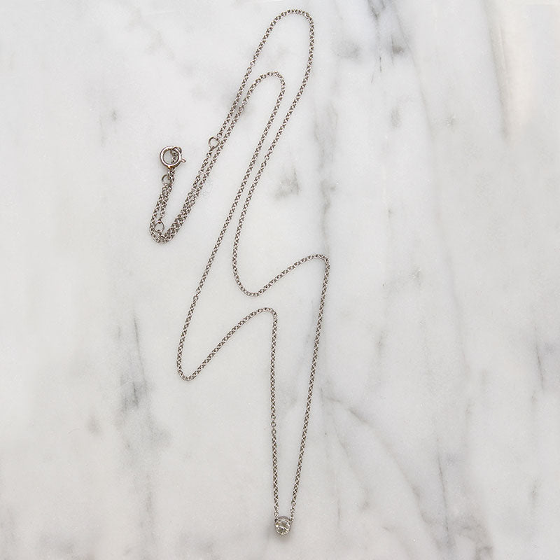 Cheeky Little .10ct Diamond in Platinum Bezel Pendant