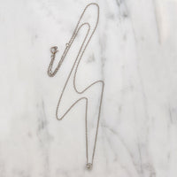 Cheeky Little .10ct Diamond in Platinum Bezel Pendant