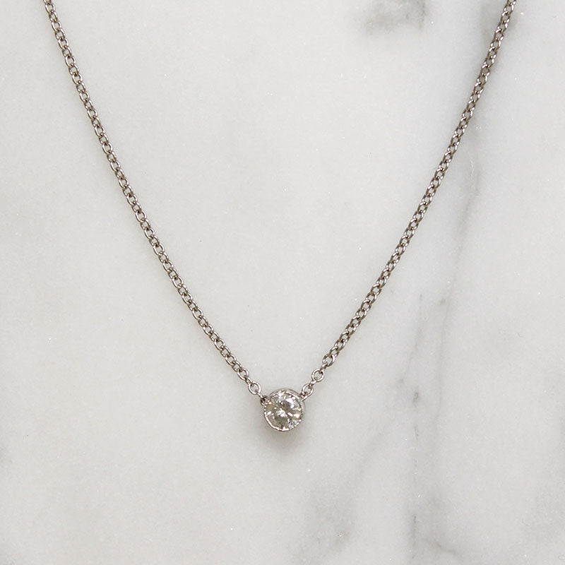 Cheeky Little .10ct Diamond in Platinum Bezel Pendant