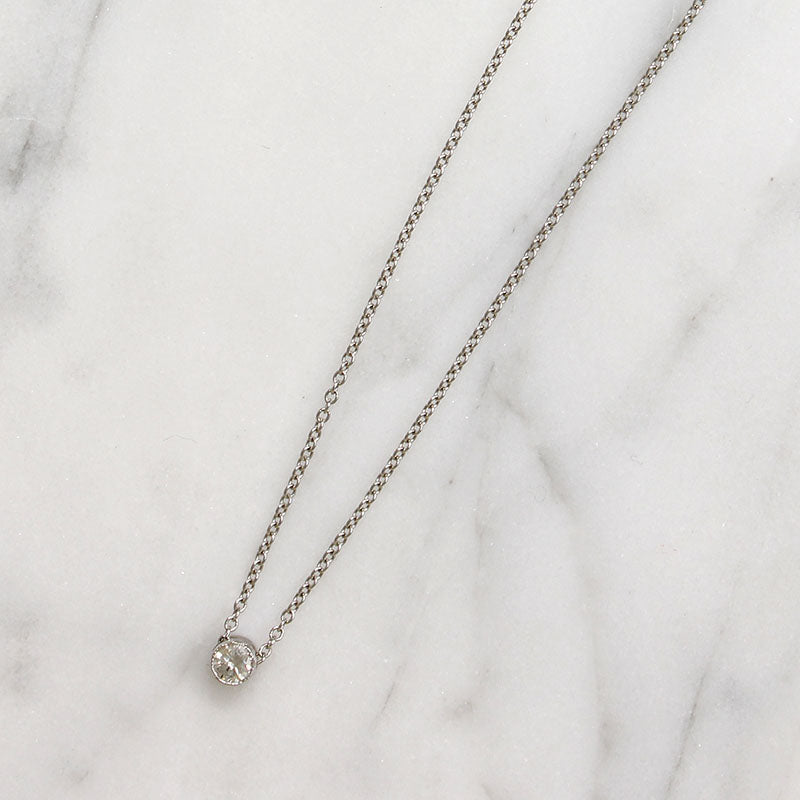 Cheeky Little .10ct Diamond in Platinum Bezel Pendant