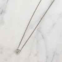 Cheeky Little .10ct Diamond in Platinum Bezel Pendant