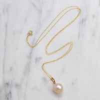 Pearl Solitaire Pendant with Soft Pink Glow